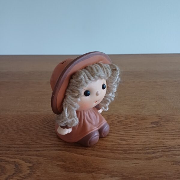 Vintage spaarpot meisje