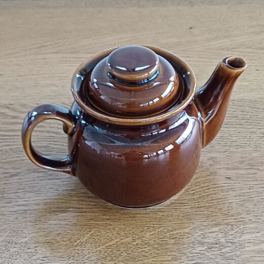 Vintage theepotje op rechaud