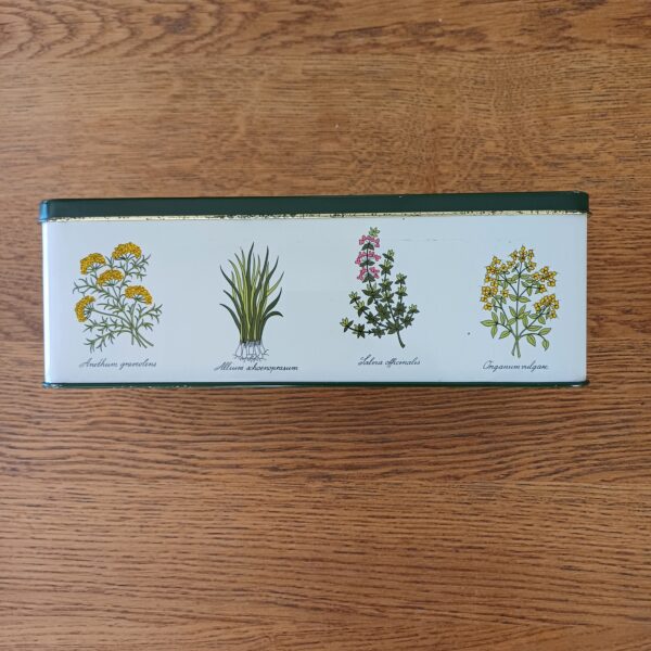 Blik met kruidenplanten