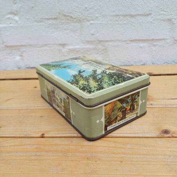 Vintage blik met diverse afbeeldingen
