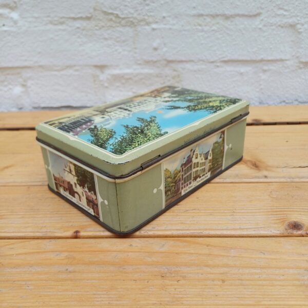 Vintage blik met diverse afbeeldingen