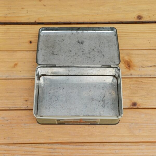 Vintage blik met diverse afbeeldingen
