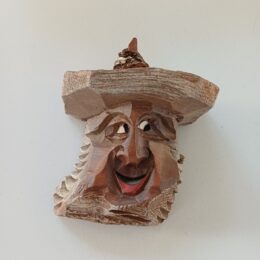 Houtsnijwerkje gezicht