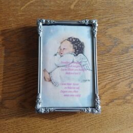 Oud fotolijstje met roosjes